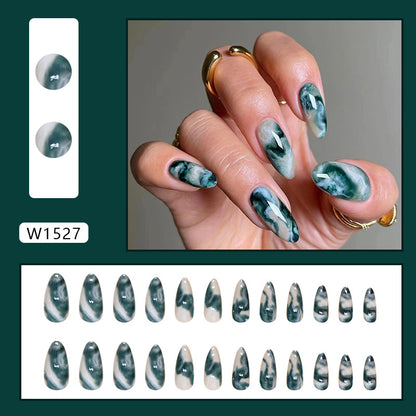 Elegant aqua marble nails with intricate patterns of turquoise and white, offering a stylish and artistic look perfect for any occasion.