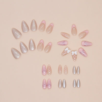 Stylish ballerina nails adorned with intricate designs and a glossy finish, showcasing a modern take on the classic ballerina shape.