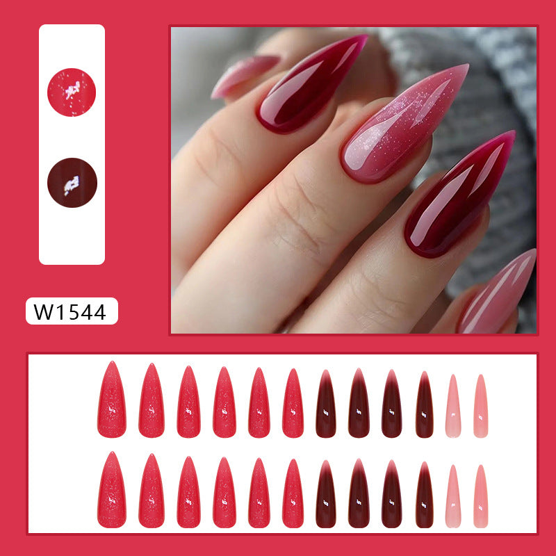 Chic almond-shaped press-on nails showcasing a playful combination of bold pink and deep red hues, ideal for a fashionable statement.