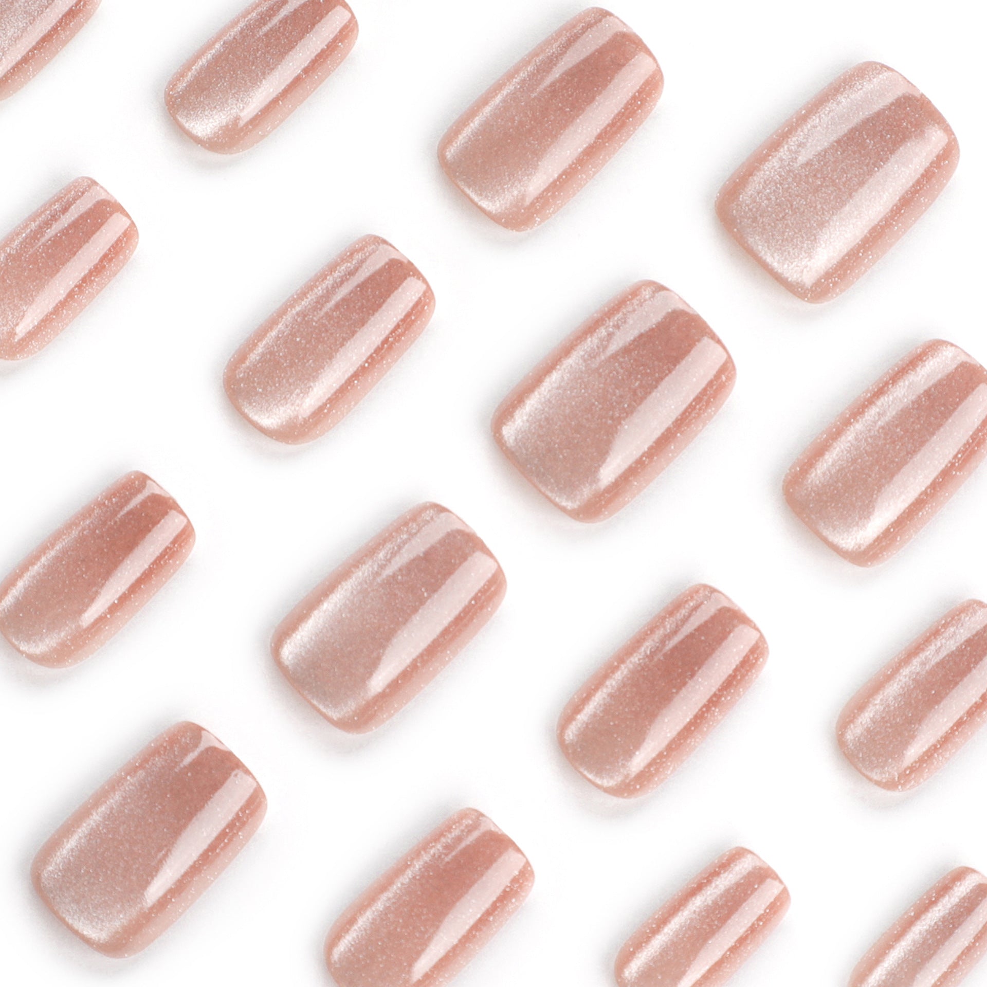 Soft caramel latte-colored nails with a creamy, polished finish, ideal for a chic and versatile look.