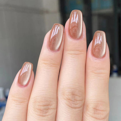 Caramel Latte nails with a warm, creamy brown tone that mimics the rich color of caramel, creating a cozy and sophisticated look.