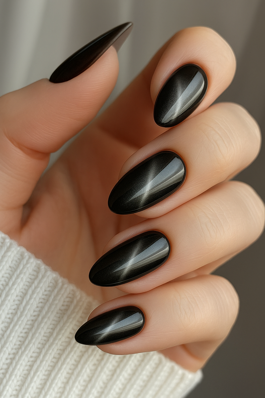 Glossy black ombré almond press-on nails set by eLanto Nails Pakistan