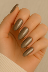 Glossy bronze shimmer almond press-on nails set by eLanto Nails Pakistan