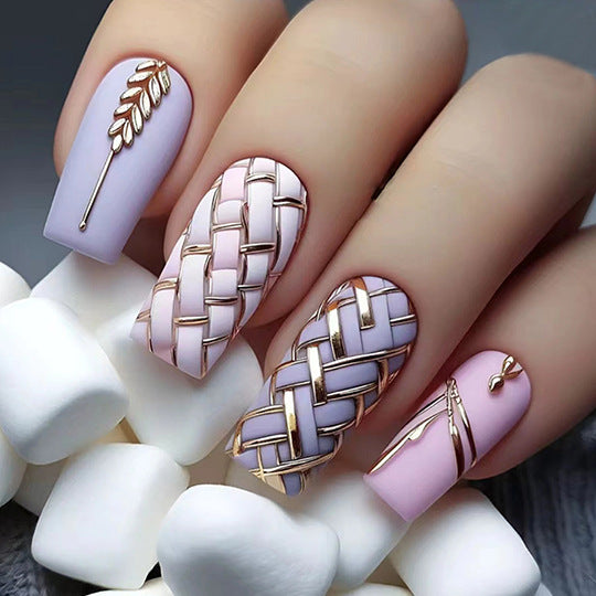 Elegant nails showcasing a refined check pattern with subtle colors, perfect for adding a sophisticated touch to your manicure.