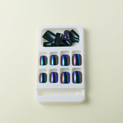 "Unique Beetle Green Chrome press-on nails with a high-shine, metallic effect."