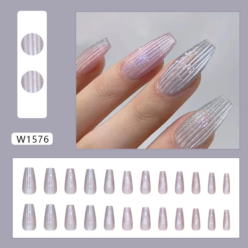 Glossy, sheer grey cat eye nails with a subtle, reflective shimmer, ideal for both day and night styles.